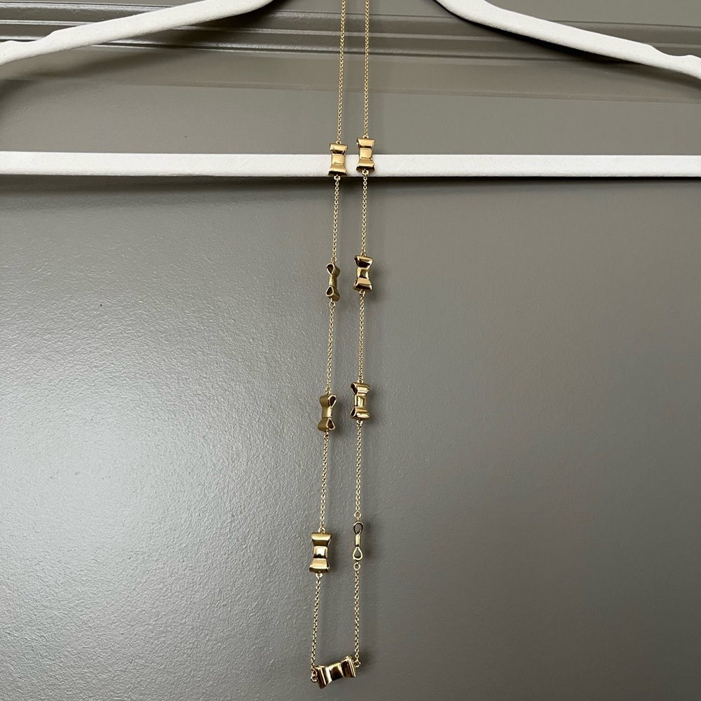 Kate Spade gold tone bow necklace